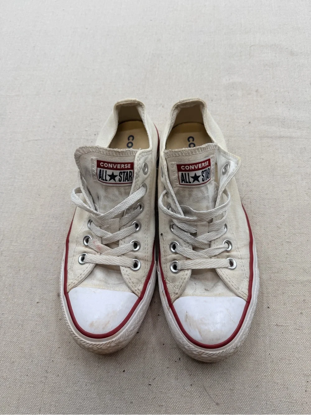 Converse White Low Top Sneakers with Red Trim
